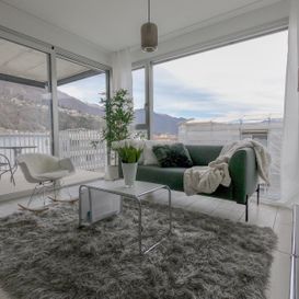 Garden Residence Ascona - Living room with view and sculptures - Kristal SA